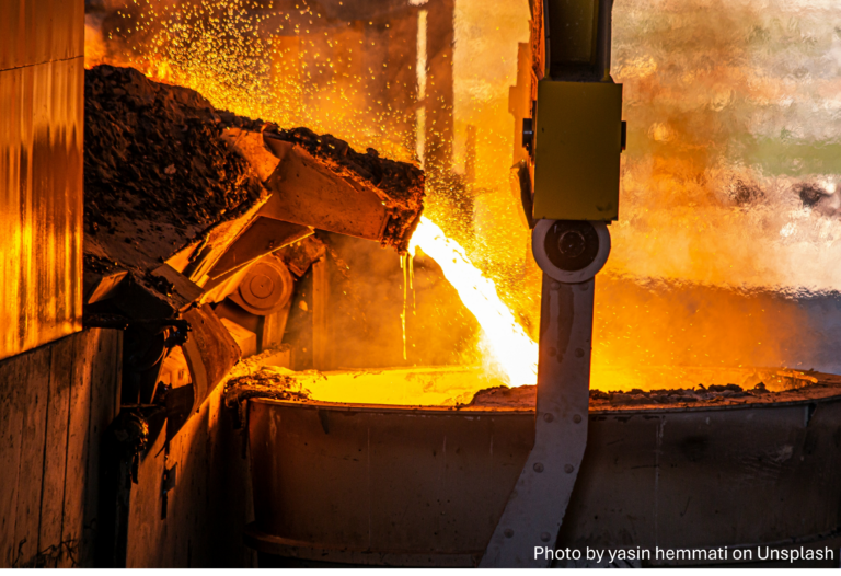 Hot, molten steel is cast in an industrial plant